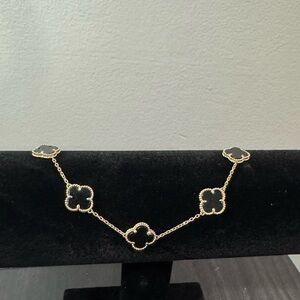 Elegant Black clover bracelet 10k size 7”